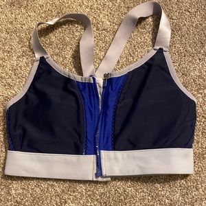 Navy and gray Fabletics sports bra